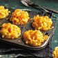 muffin tin filled with mac and cheese