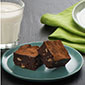 plate of brownies with glass of milk on the side