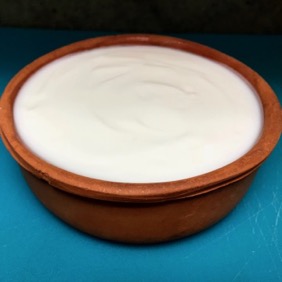 earthenware pot of yogurt