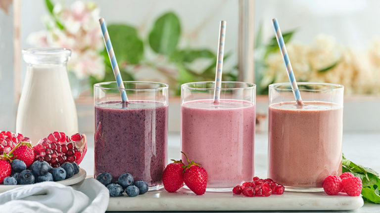 three fruit smoothies made with canadian milk