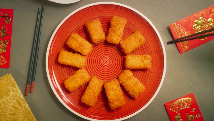 Plate of fried milk and red envelope