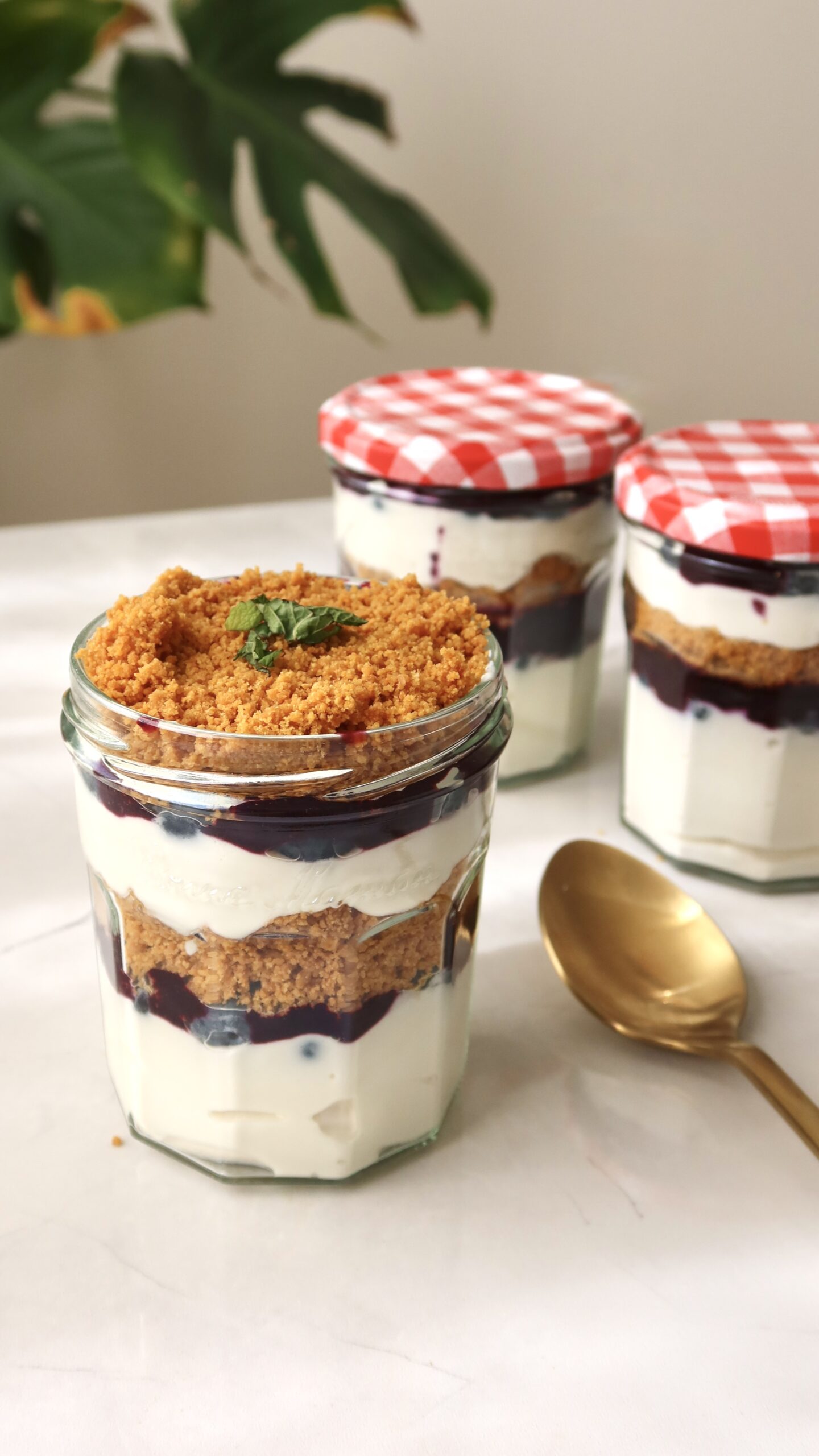 Blueberry parfait in glass jars